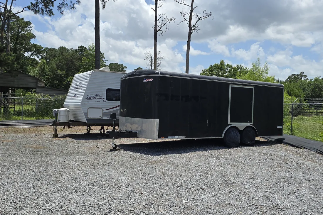 Enclosed trailer parked in the vehicle and RV storage lot at AAA Vault Storage